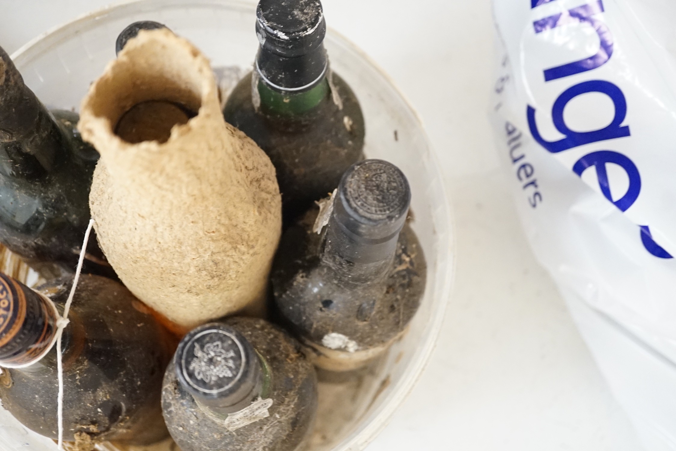 Seven mixed bottles of brandy and port